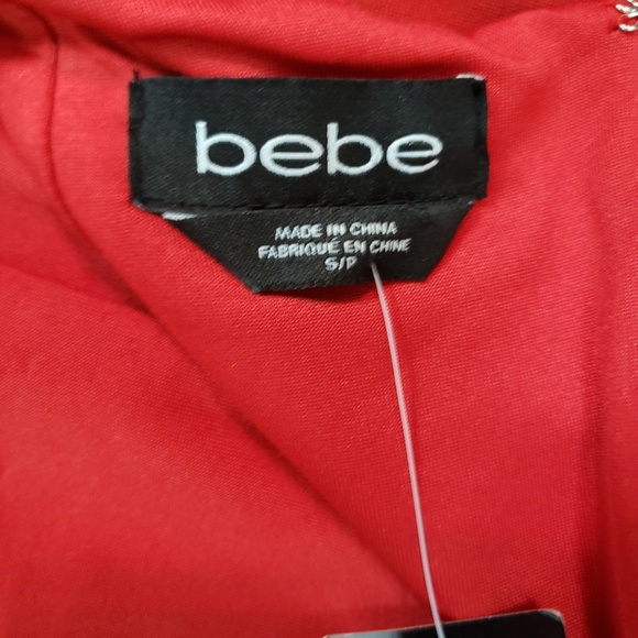 Bebe | Red Cut Mariah Pepulm Dress - Picture 7 of 8